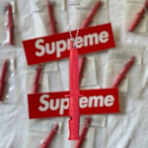Supreme emergency whistle keychain